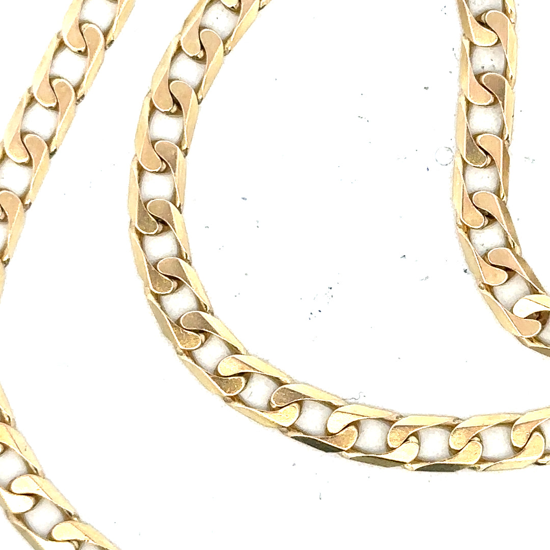 Unbranded 9ct yellow gold curb chain, 15.9g, with a detailed link pattern, showcasing its elegant jewelry design.