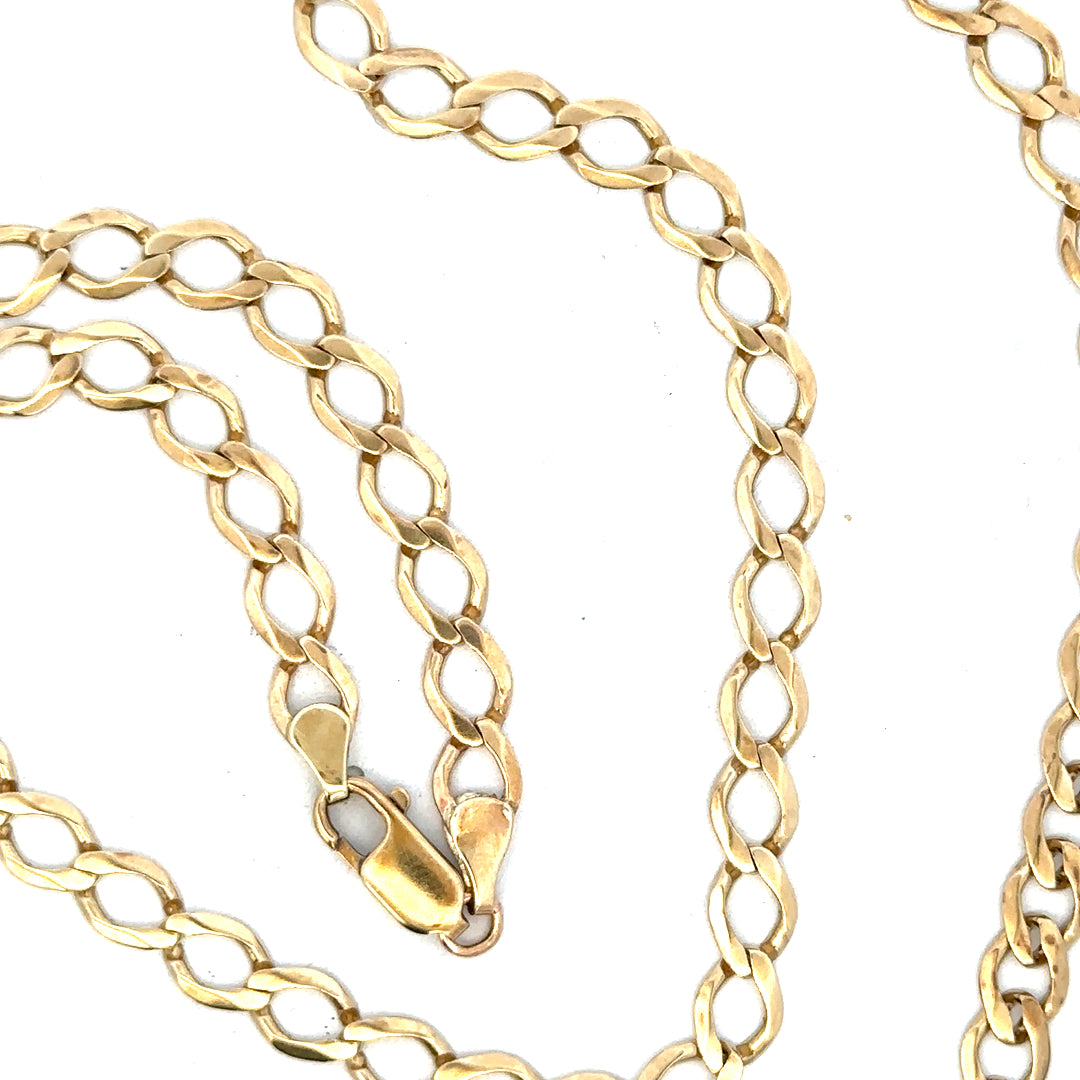 9ct yellow gold curb chain weighing 16.3g, unbranded jewelry chain with a classic curb link design.