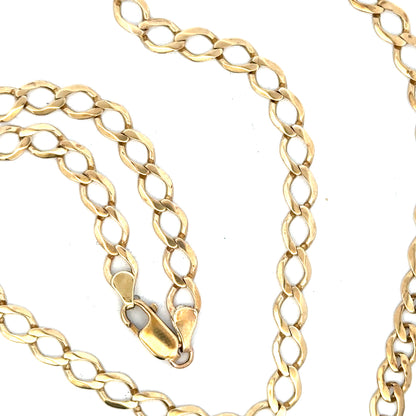 9ct yellow gold curb chain weighing 16.3g, unbranded jewelry chain with a classic curb link design.