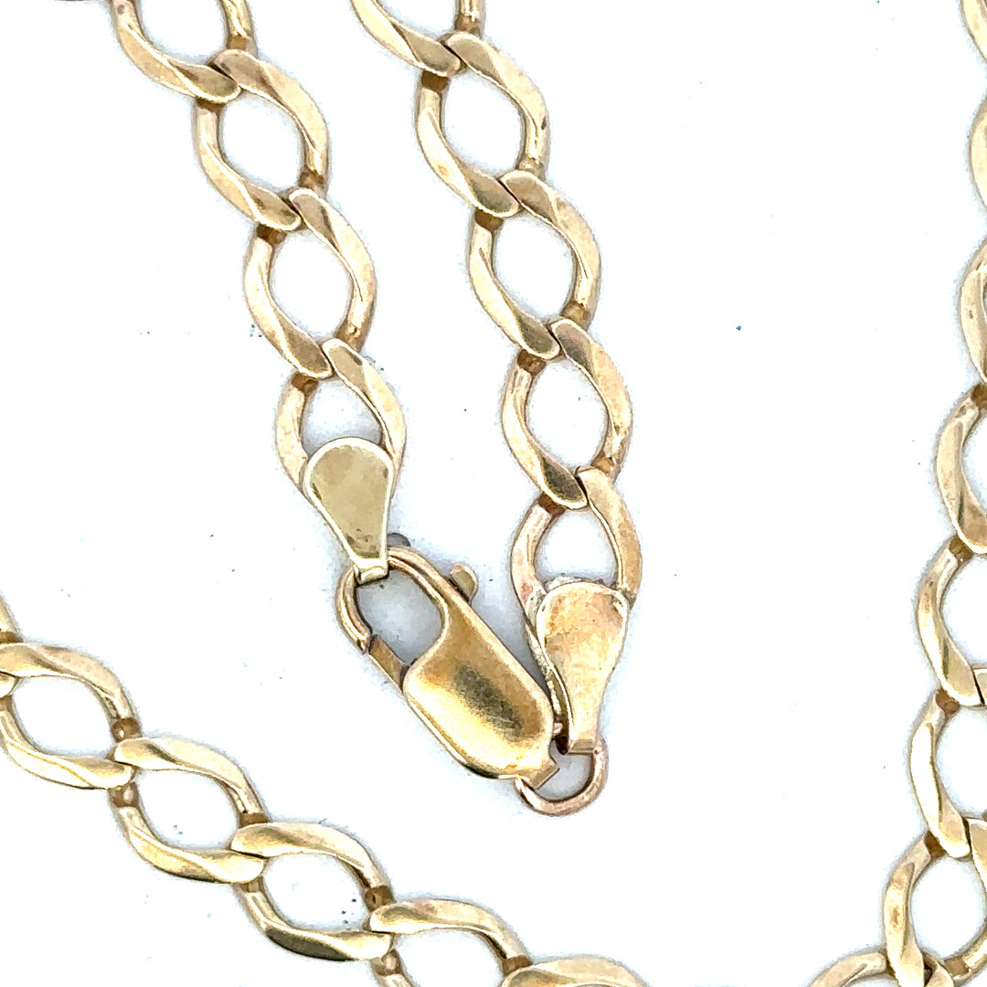 9ct yellow gold curb chain weighing 16.3g, featuring classic linked design, unbranded jewelry accessory with a polished finish.