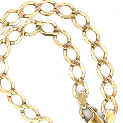 9ct yellow gold curb chain weighing 16.3g, unbranded jewelry chain with a classic link design, shown in close-up.