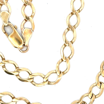 9ct yellow gold curb chain, unbranded, 16.3g, showcasing the detailed links and shiny finish of this elegant jewelry piece.