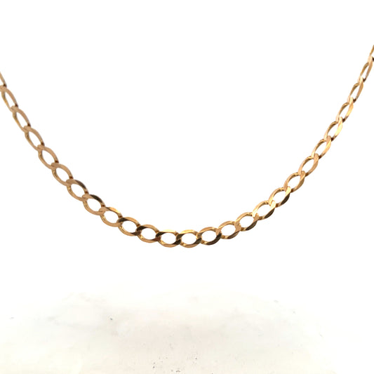 9ct yellow gold curb chain weighing 17.3g, unbranded jewelry chain with a classic curb link design, displayed on a plain background