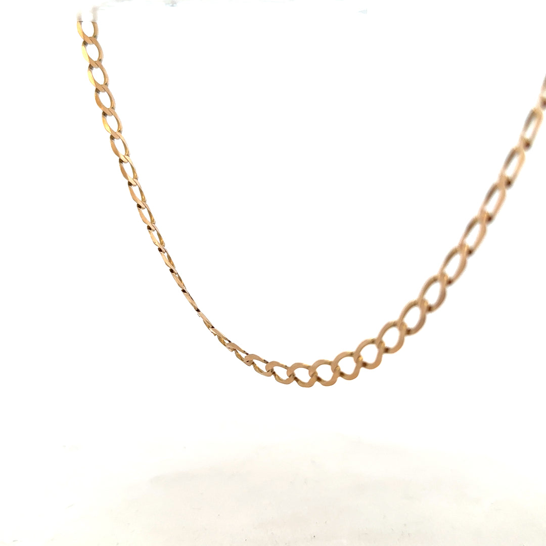 9ct yellow gold curb chain weighing 17.3g, unbranded jewelry chain with a classic design and detailed link pattern.