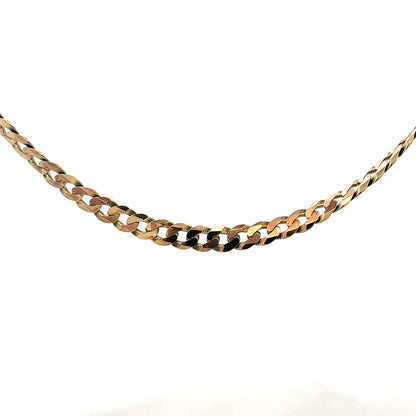 9ct yellow gold curb chain weighing 25.4g, unbranded jewelry chain with a classic curb link design.