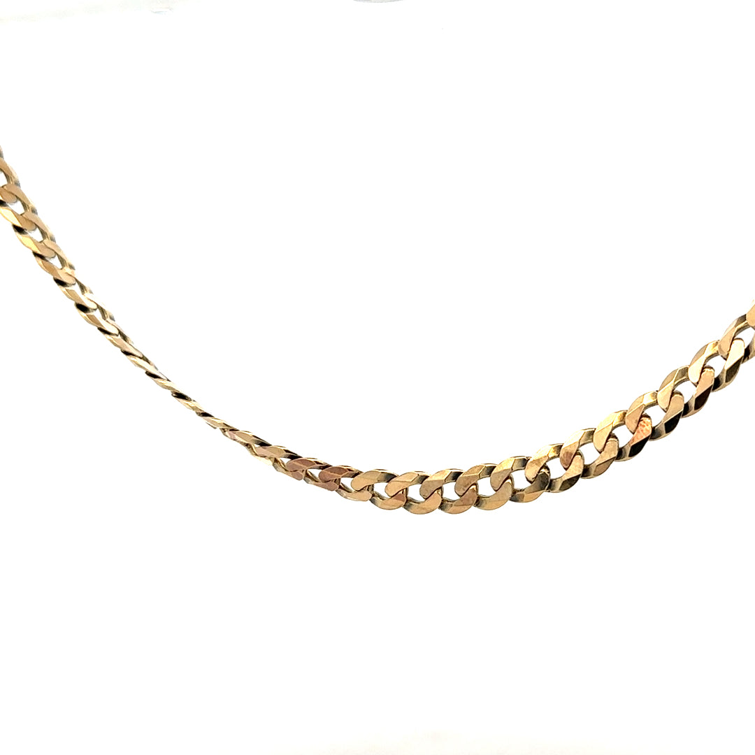 9ct yellow gold curb chain weighing 25.4g, unbranded jewelry chain with a classic design and polished finish.