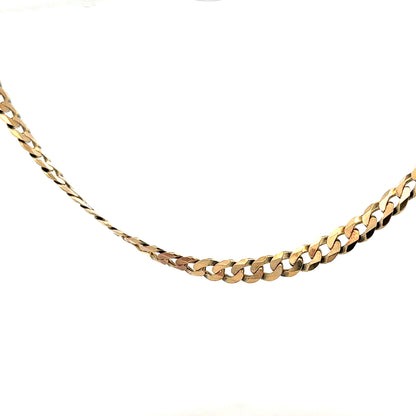 9ct yellow gold curb chain weighing 25.4g, unbranded jewelry chain with a classic design and polished finish.
