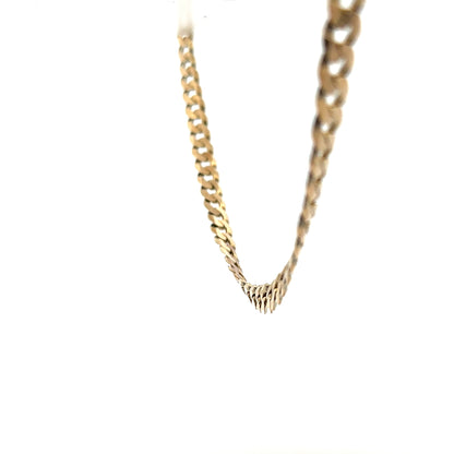 9ct yellow gold curb chain, unbranded, showcasing its shiny links and sturdy design, weighing 25.4 grams.