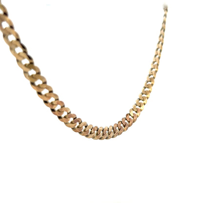 9ct yellow gold curb chain weighing 25.4g, unbranded jewelry chain with a classic curb link design, displayed against a neutral background.