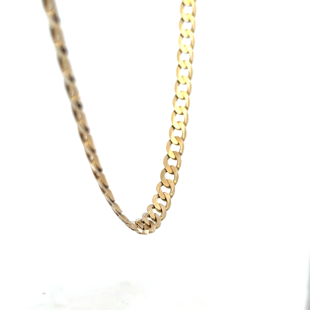 9ct yellow gold curb chain weighing 30.3g, with a classic linked design, unbranded jewelry piece displayed on a neutral background.