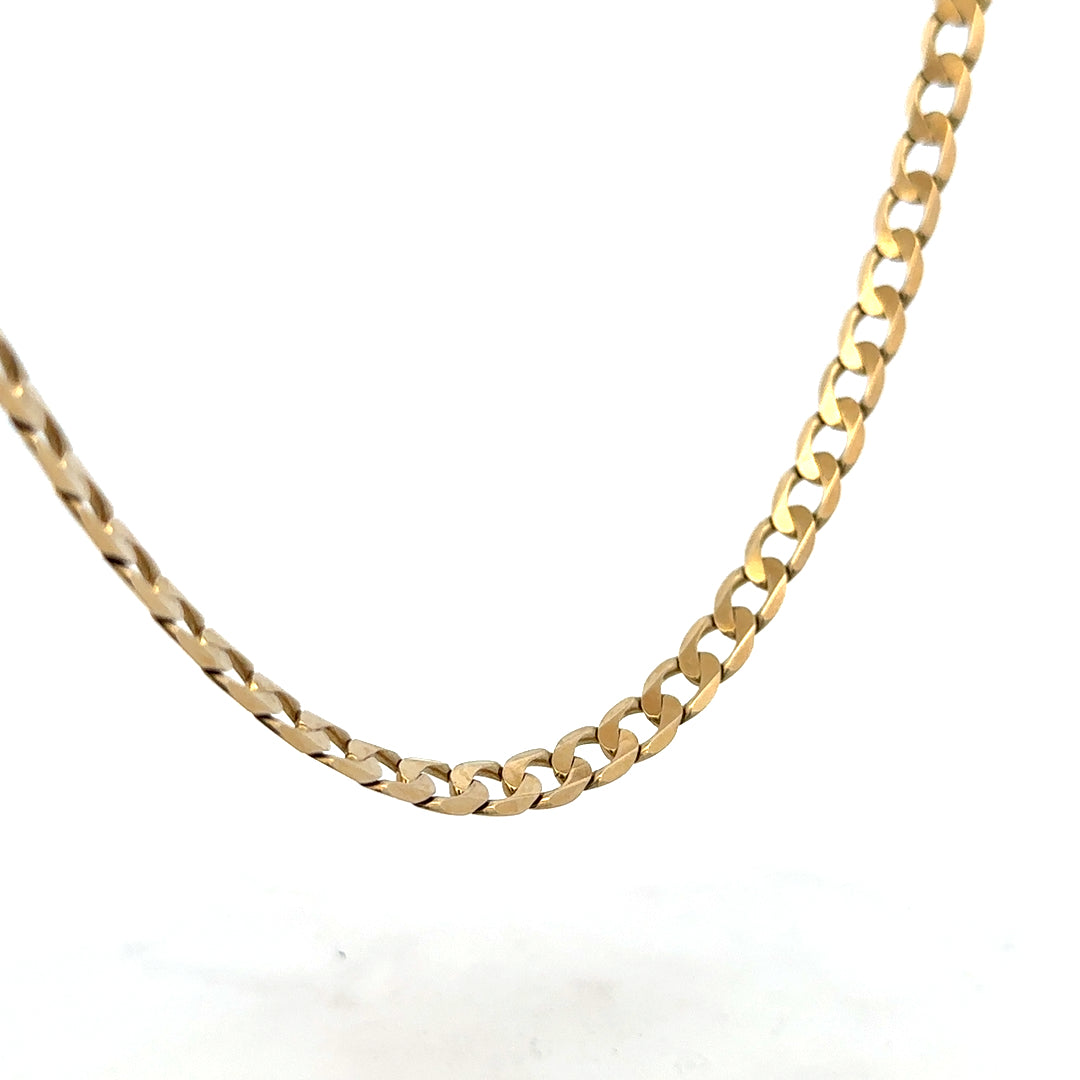 9ct yellow gold curb chain weighing 30.3g, featuring classic interlinked design, unbranded jewelry chain for men or women.