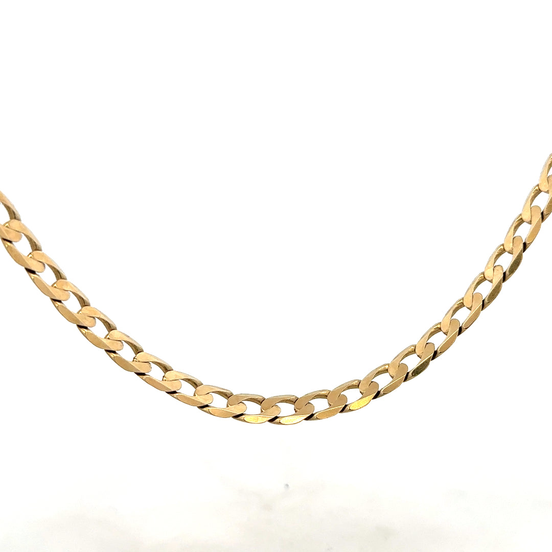 9ct yellow gold curb chain weighing 30.3g, unbranded jewelry chain with a classic design, shown in the image.