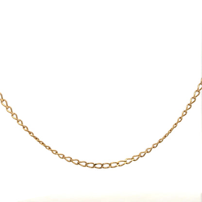 9ct yellow gold curb chain, 5.9g, unbranded jewelry accessory, close-up showing the detailed links and polished finish.