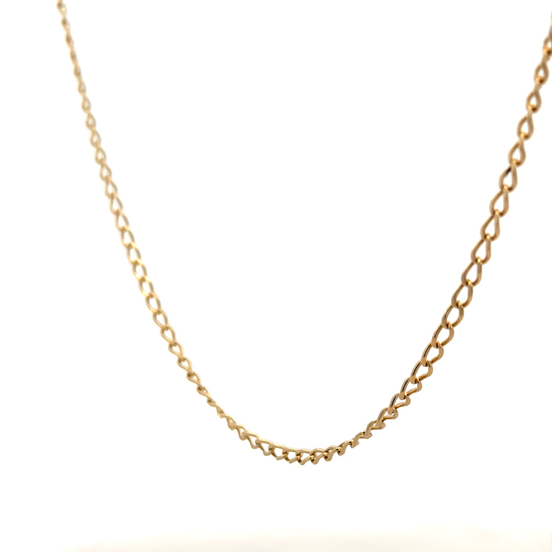 9ct yellow gold curb chain weighing 5.9g, unbranded, with detailed links, showcasing a classic jewelry chain design.