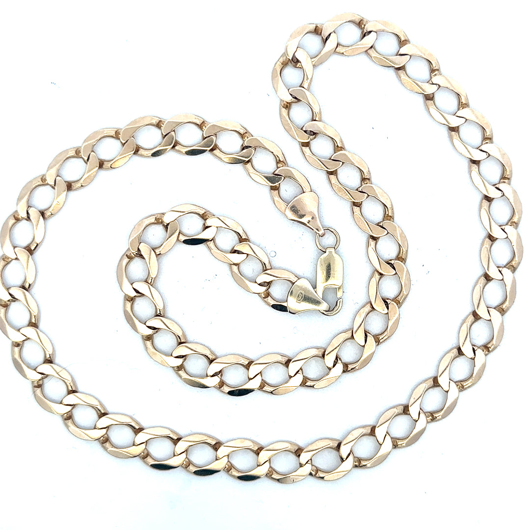 9ct yellow gold curb chain, unbranded, with a weight of 53.9g, featuring classic link design and polished finish.