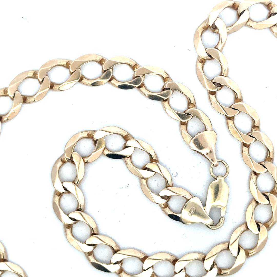 9ct yellow gold curb chain weighing 53.9g, unbranded jewelry chain with a classic curb link design.
