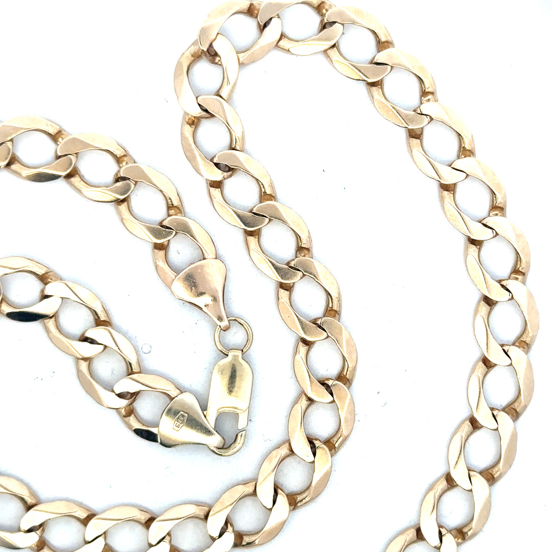 9ct yellow gold curb chain, unbranded, weighing 53.9g, showing the detailed linked design on a plain background.