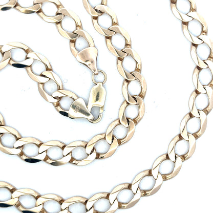 9ct yellow gold curb chain with a 53.9g weight, featuring classic linked design, on a neutral background.