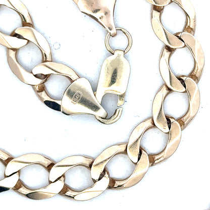 9ct yellow gold curb chain weighing 53.9g, unbranded jewelry chain with a classic design and polished finish.