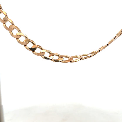 9ct yellow gold curb chain, unbranded, 61.2g, showcasing the detailed link design and polished finish.