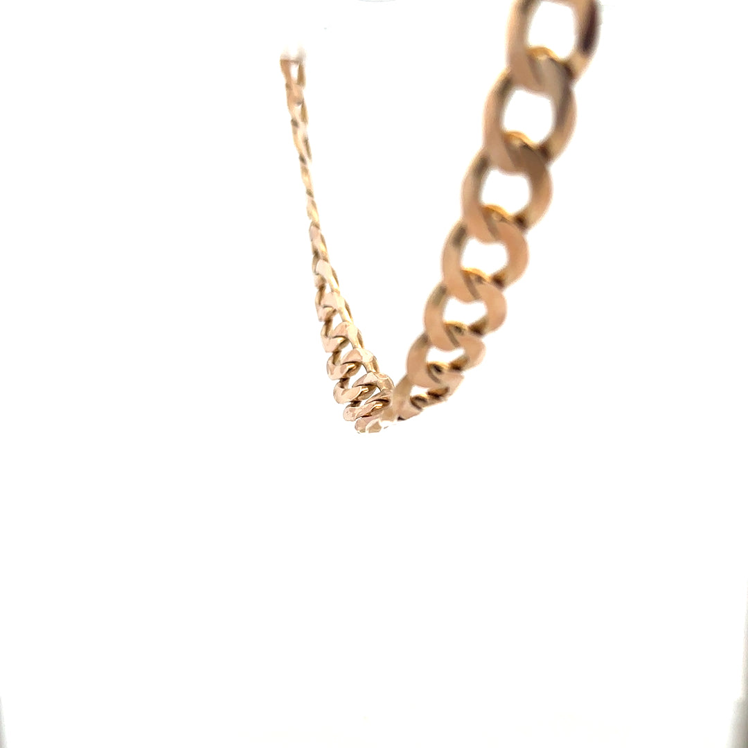9ct yellow gold curb chain, unbranded, showcases a thick, polished jewelry chain weighing 61.2 grams.