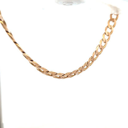 9ct yellow gold curb chain showing its textured links, weighing 61.2 grams, unbranded jewelry chain for men or women.