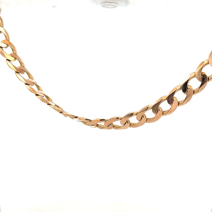 9ct yellow gold curb chain, unbranded, weight 61.2g, featuring classic interlinked design with a polished finish