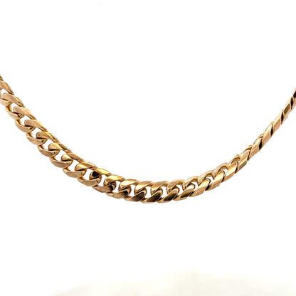 9ct yellow gold curb chain weighing 61.4g, unbranded jewelry chain with classic curb link design.