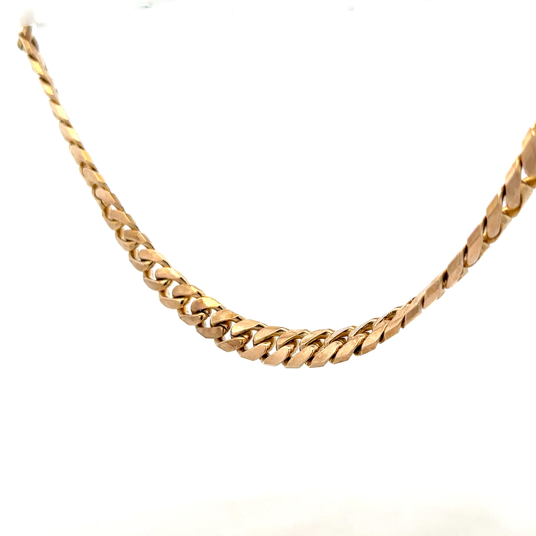 9ct yellow gold curb chain weighing 61.4g, showcasing a classic and sturdy jewelry chain with a polished finish.