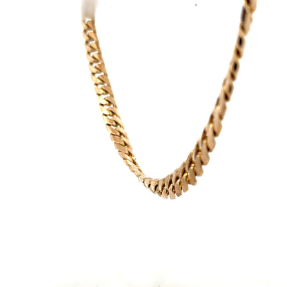 9ct yellow gold curb chain weighing 61.4g, unbranded jewelry chain with a classic curb link design.