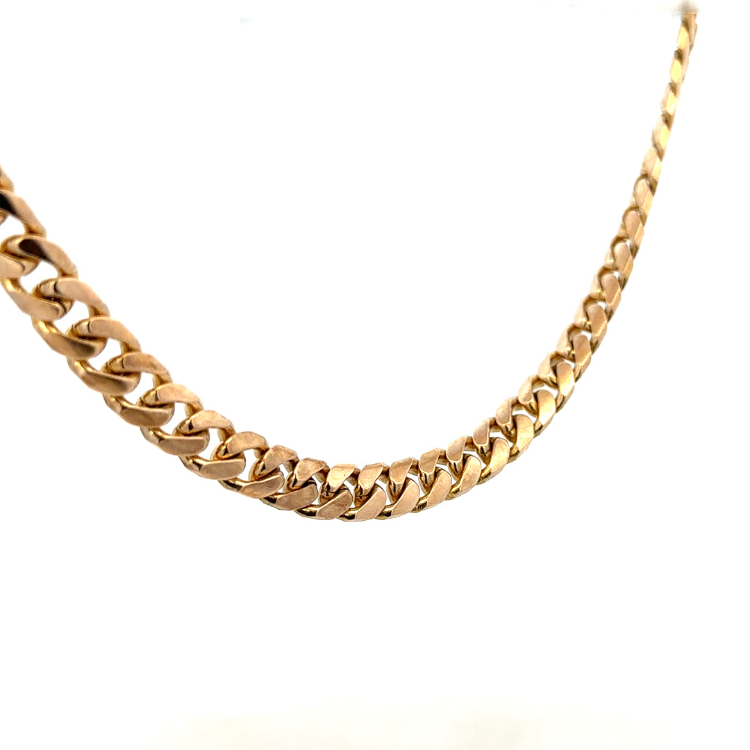 9ct yellow gold curb chain weighing 61.4g, unbranded jewelry chain with a classic curb link design.