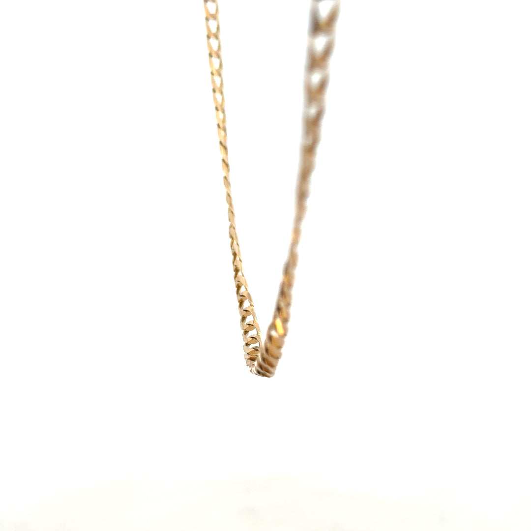 9ct yellow gold curb chain, unbranded, weighing 9.9g, showcasing the classic interlinked chain design.