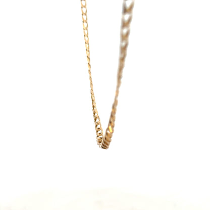 9ct yellow gold curb chain, unbranded, weighing 9.9g, showcasing the classic interlinked chain design.
