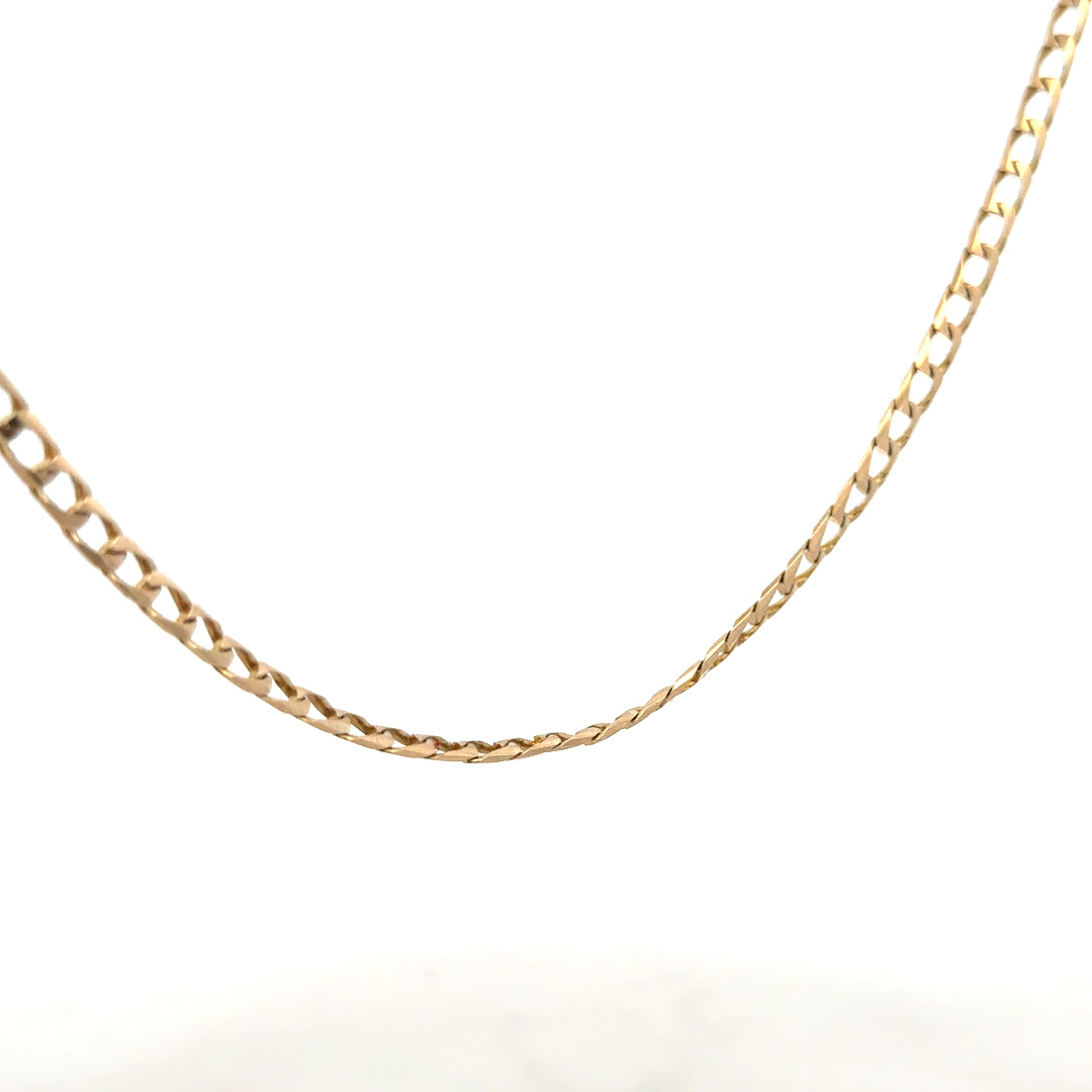9ct yellow gold curb chain weighing 9.9g, unbranded jewelry chain with a classic curb link design.