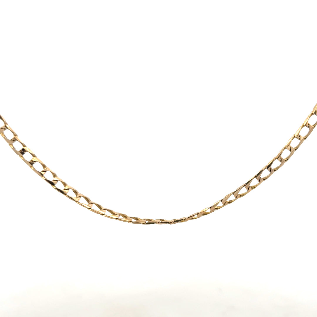 9ct yellow gold curb chain weighing 9.9g, showcasing a classic and durable jewelry chain with detailed links.