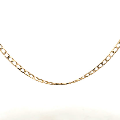 9ct yellow gold curb chain weighing 9.9g, showcasing a classic and durable jewelry chain with detailed links.