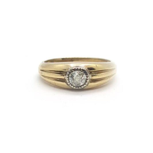 9ct yellow gold diamond ring with a sparkling central diamond and a polished band, unbranded jewelry for elegant style.