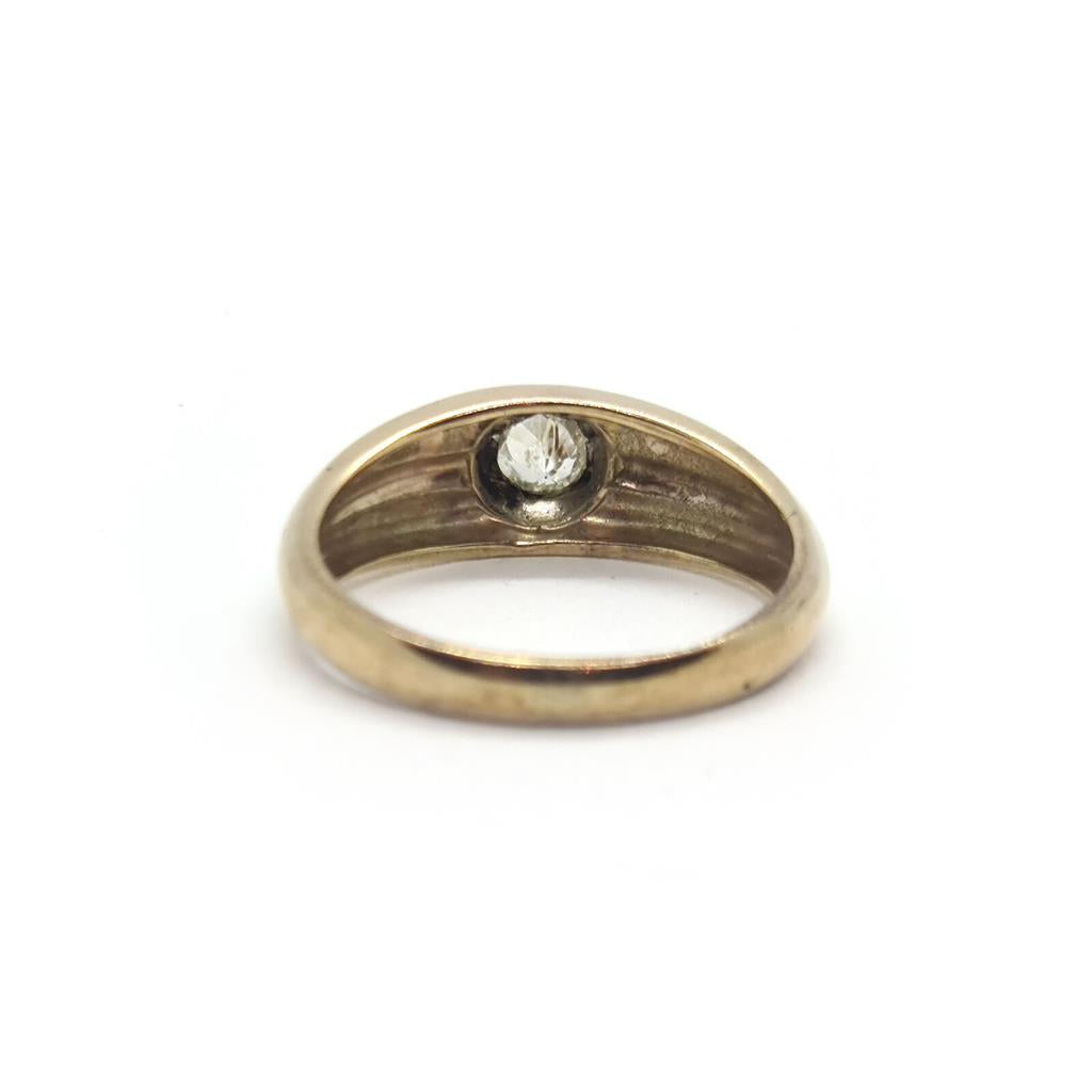 9ct yellow gold diamond ring with a polished finish, featuring a central sparkling diamond on a simple band.