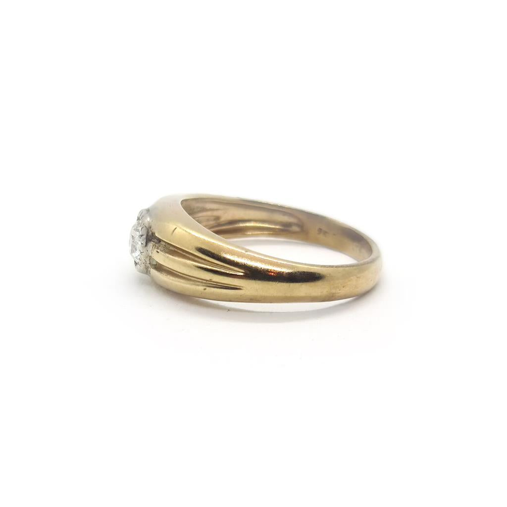 9ct yellow gold diamond ring with a sleek band and sparkling diamond accents, unbranded jewelry item.