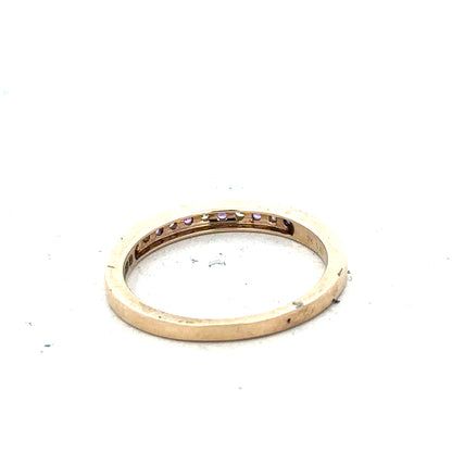 9ct yellow gold ring with diamond and amethyst gemstones, size N, featuring a detailed design on a neutral background.