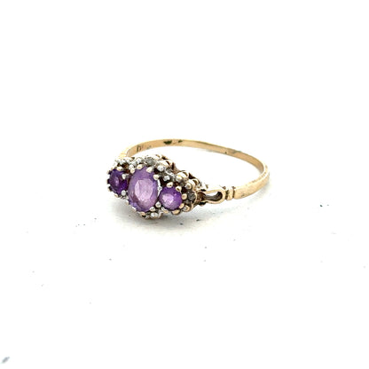 9ct yellow gold ring with diamond and amethyst, size Q, featuring a detailed gemstone design.