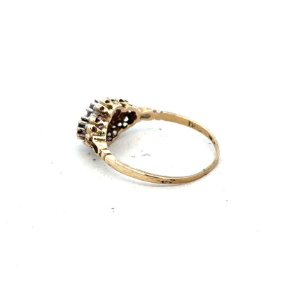 9ct yellow gold ring with diamond and amethyst, size Q, featuring a detailed gemstone design.