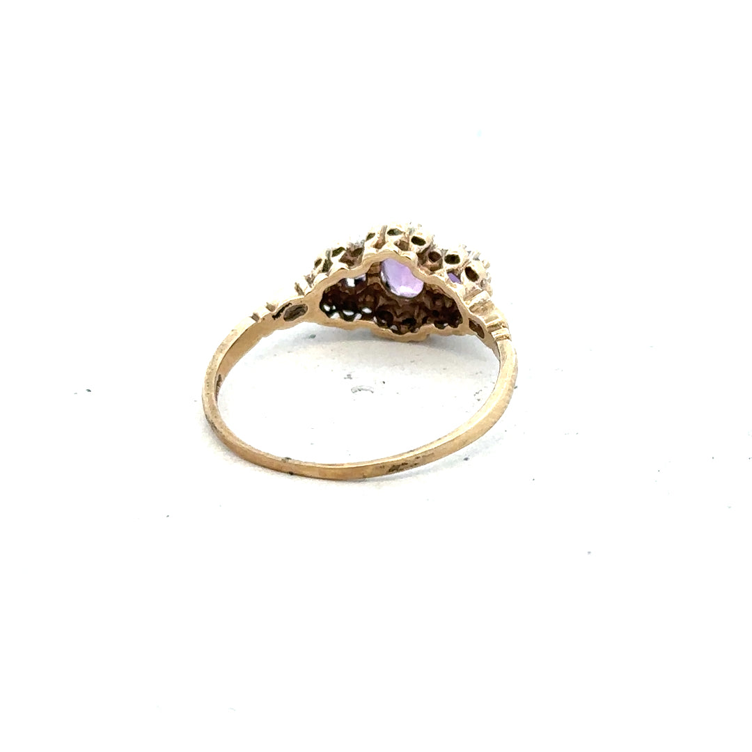 9ct yellow gold ring featuring diamonds and amethyst, size Q, with intricate detailing and elegant design.