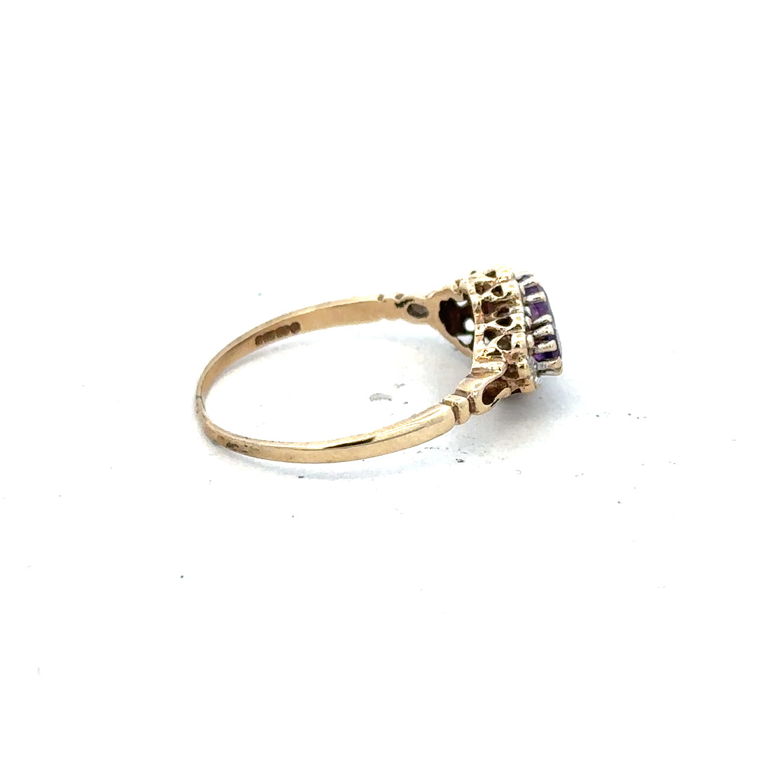 9ct yellow gold ring with diamond and amethyst, size Q, featuring a detailed gemstone design.