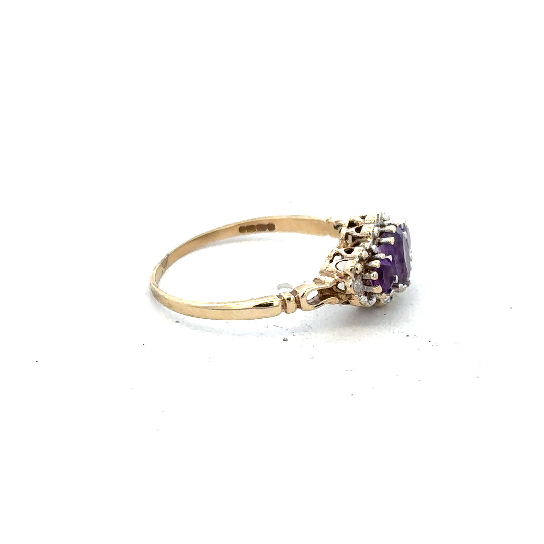9ct yellow gold ring with diamond and amethyst gemstones, size Q, showcasing elegant jewelry design and vibrant gemstone details.