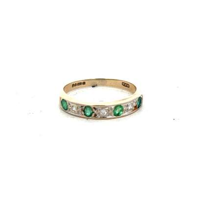 9ct yellow gold ring featuring diamonds and emeralds, size K, showcasing intricate gemstone design and luxurious craftsmanship.