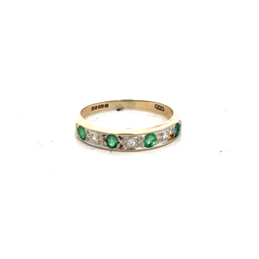 9ct yellow gold ring featuring diamonds and emeralds, size K, showcasing intricate gemstone design and luxurious craftsmanship.