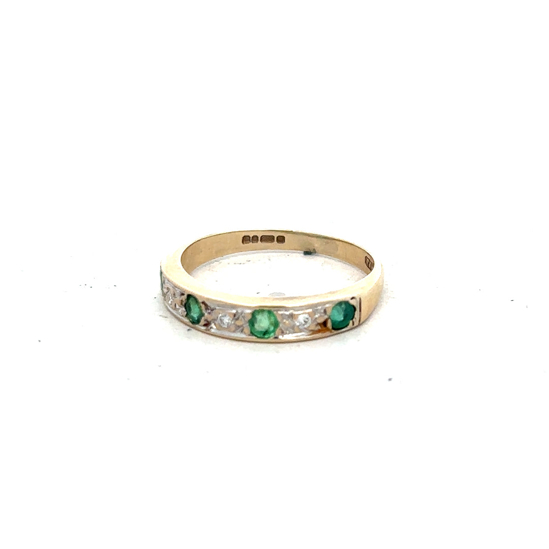 9ct yellow gold ring with diamonds and emeralds, size K, featuring detailed gemstone settings and elegant design.