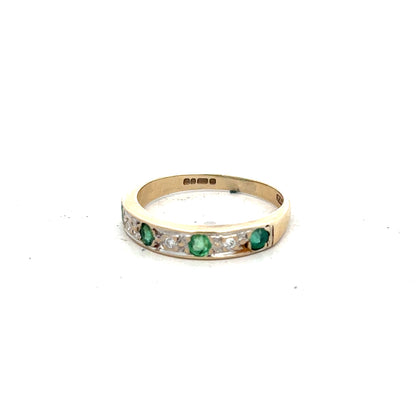 9ct yellow gold ring with diamonds and emeralds, size K, featuring detailed gemstone settings and elegant design.
