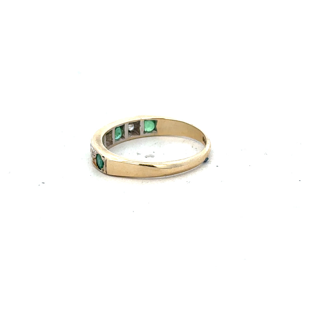9ct yellow gold ring with diamond and emerald accents, size K, featuring intricate design and sparkling gemstones.